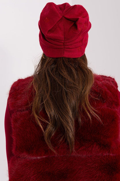 Luxurious women's cashmere blend beanie hat adorned with rhinestones by AT, perfect for winter warmth and style.