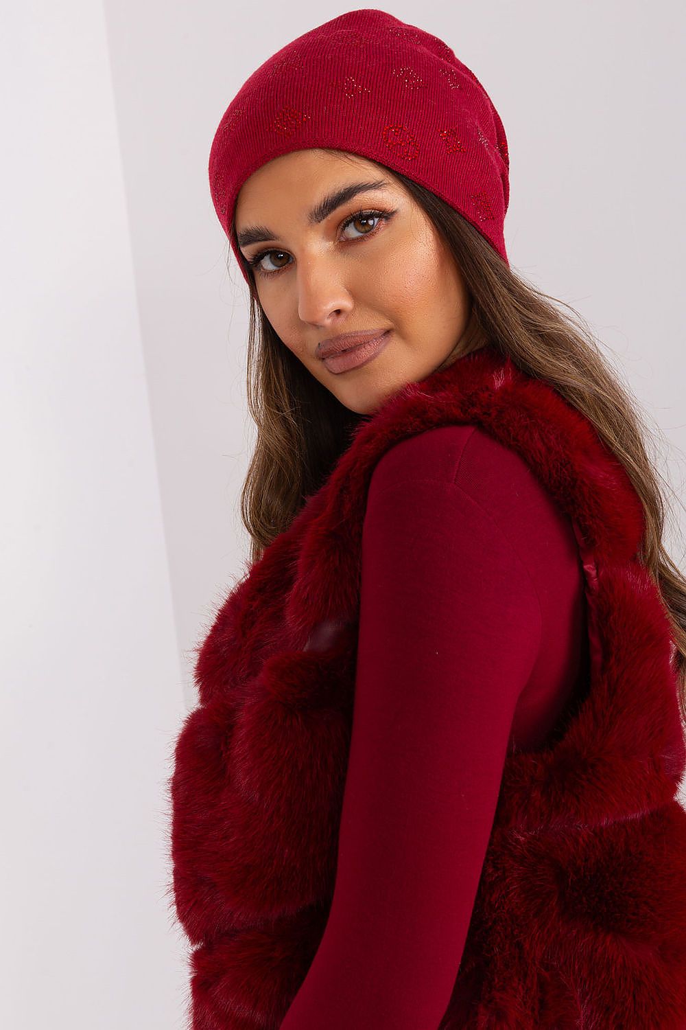 Close-up of AT's elegant women's beanie hat featuring a cashmere blend and sparkling rhinestones, ideal for chic winter attire.