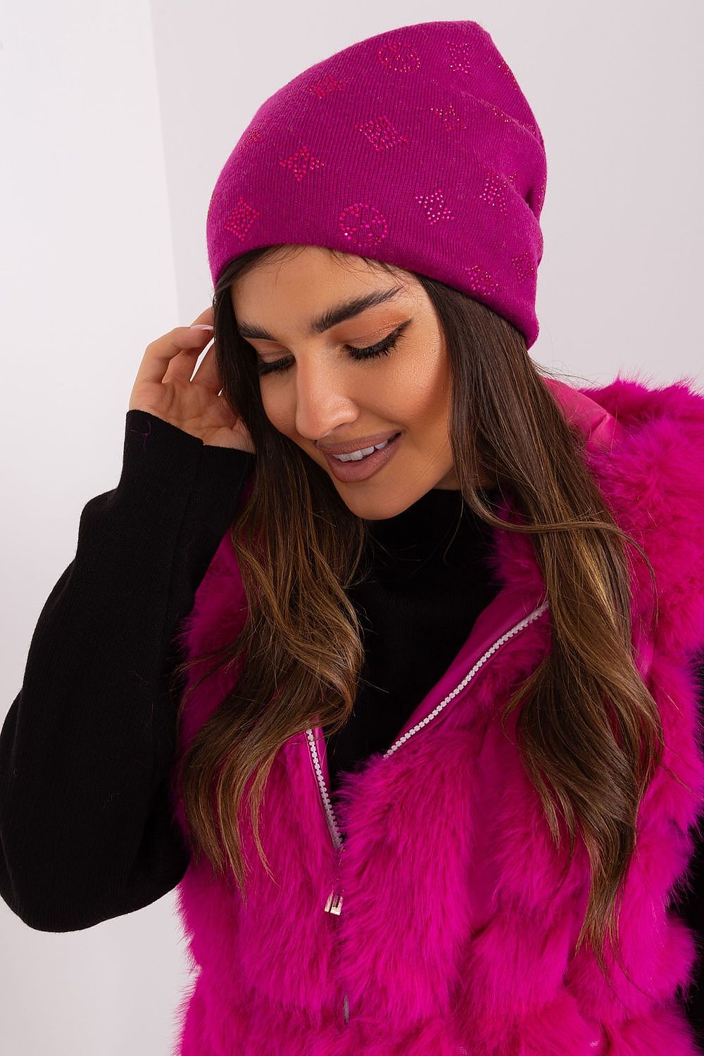 Fashionable women's cashmere blend beanie hat with rhinestone embellishments by AT, a must-have accessory for a luxurious winter.