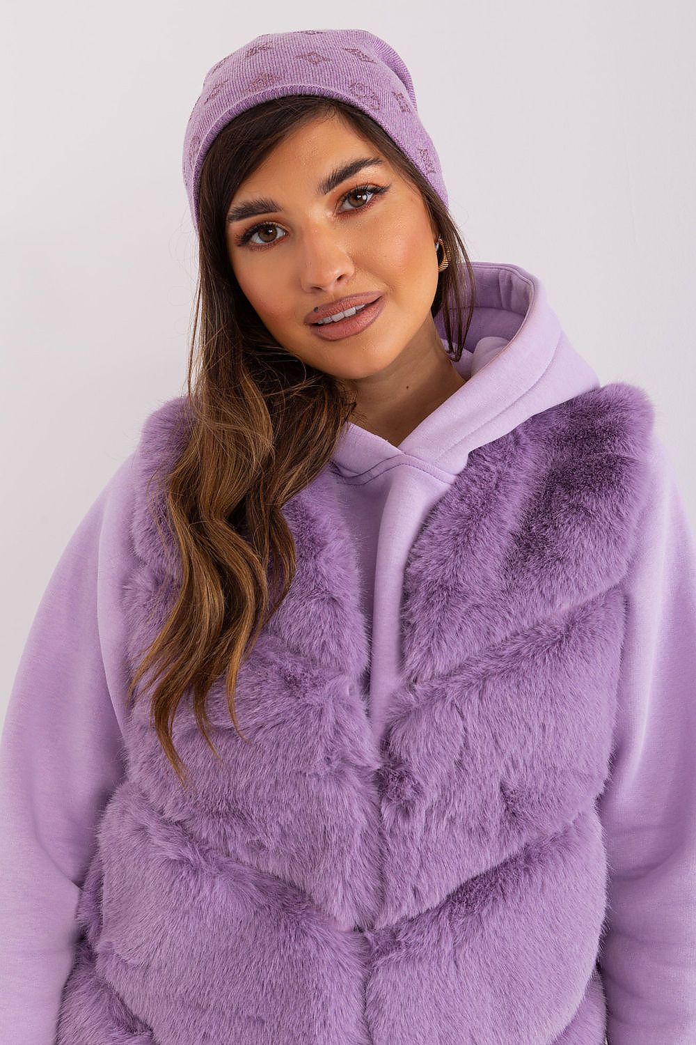 Elegant close-up of AT's women's cashmere blend beanie hat featuring intricate rhinestone detailing for a stylish winter look.