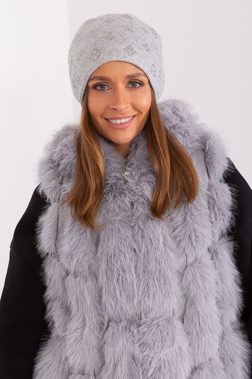 Stylish winter beanie featuring decorative rhinestones, crafted from a luxurious cashmere blend by AT.