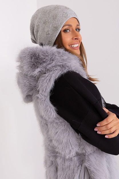 Sophisticated women's winter beanie crafted by AT, featuring a cashmere blend and sparkling rhinestone details.