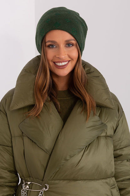 Elegant cashmere blend women's winter beanie by AT adorned with rhinestones, an essential accessory for cold weather.