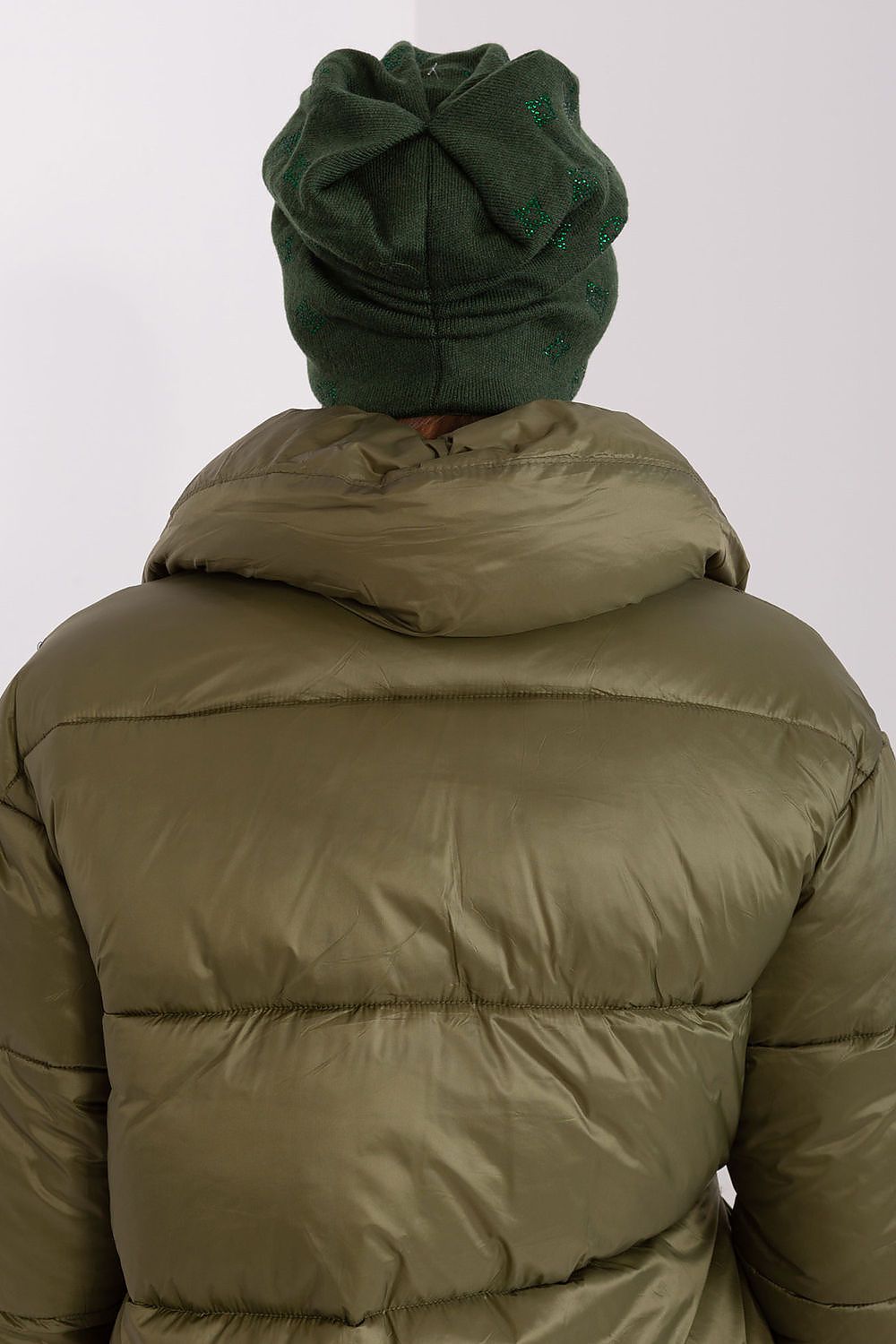 Chic women's cashmere blend beanie with striking rhinestone detail by AT, ideal for a fashionable winter.