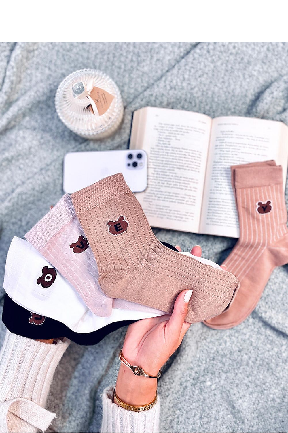 Close-up of Inello's elegant long socks with cute teddy bear accents, made from a plush cotton-blend, perfect for adding charm to your wardrobe.