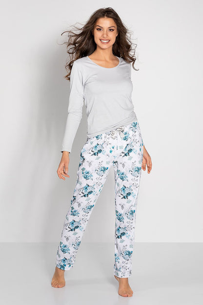 Luxury women's pajamas set by Momenti Per Me featuring a long sleeve blouse in elegant design and chic long pants, hypoallergenic materials, OEKO-TEX certified for skin safety.