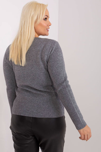 Beautifully designed plus size women's leisure sweater featuring a classic round neckline and charming pom-pom detail, presented by Factory Price.