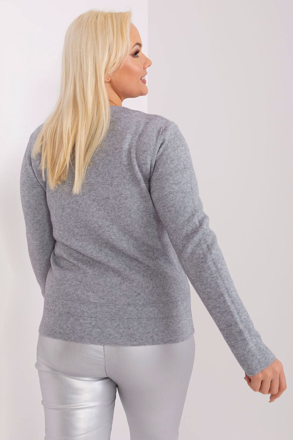 Stylish long sleeve plus size sweater with a round neckline from Factory Price, featuring charming pom-pom accents for a touch of luxury.
