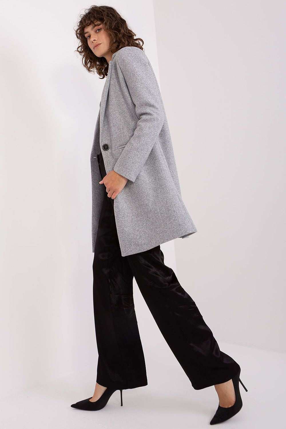 Elegant Och Bella women's coat showcasing a button closure and long sleeves, ideal for both casual and formal occasions.
