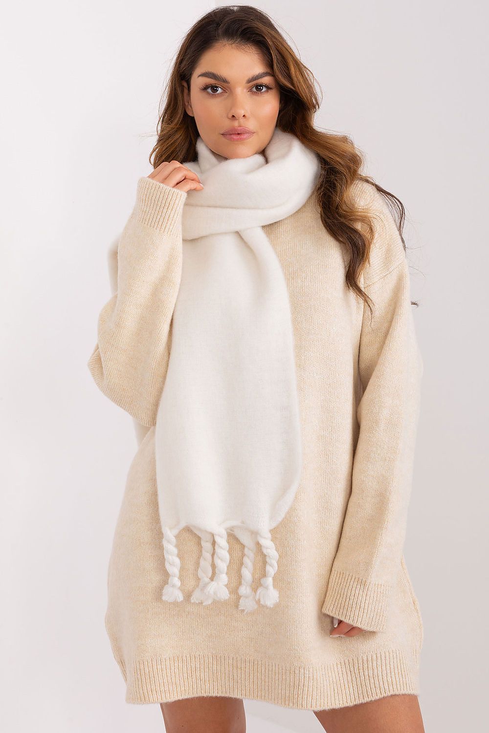 AT's luxurious 100% polyester long scarf showcasing its smooth texture, ideal for warmth and style in colder seasons.