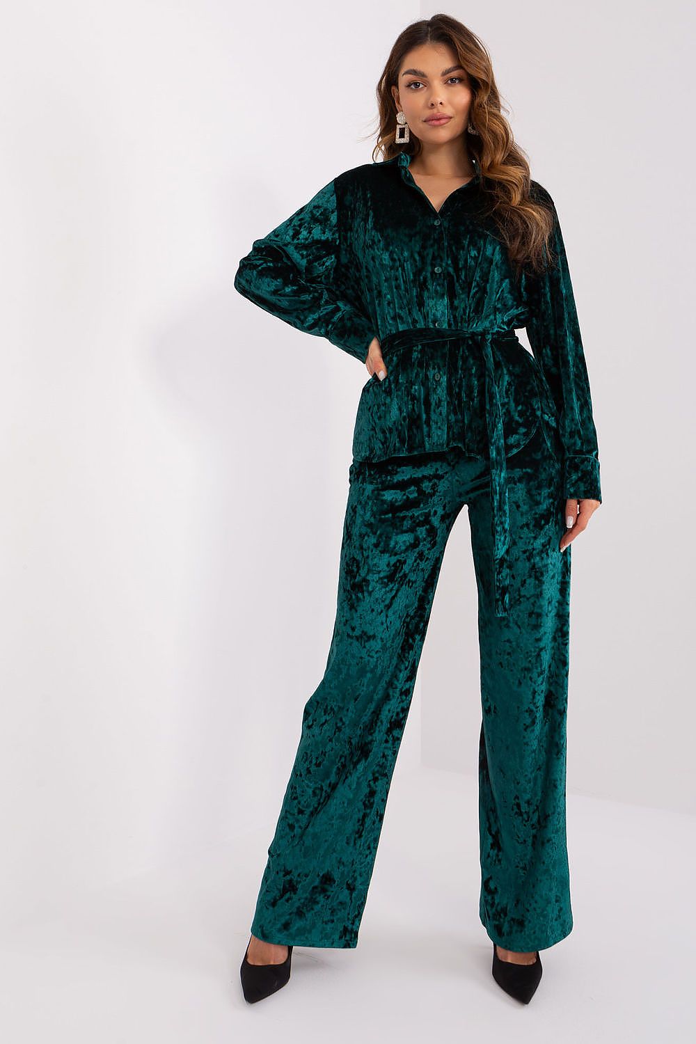 Luxurious velour set by Lakerta featuring high waist pants and stylish button-up shirt in a soft fabric, designed for casual elegance and comfort.