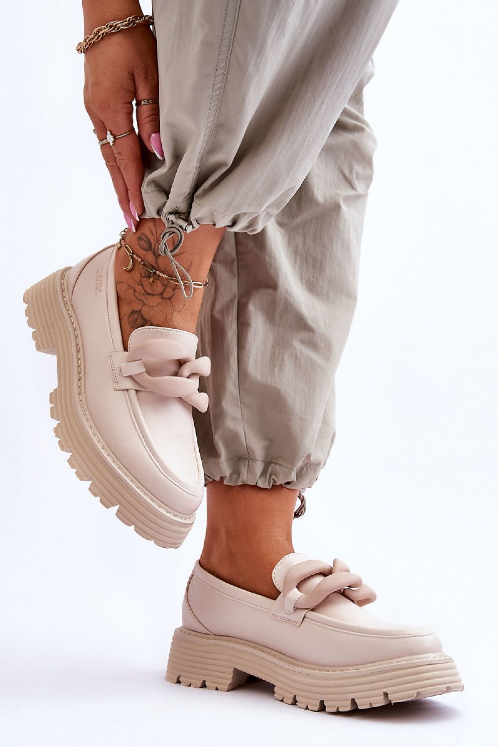 Luxury eco-friendly moccasins by Step in Style adorned with a decorative chain, featuring a comfortable 4.5 cm flat heel and crafted from high-quality ecological leather.