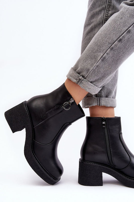 Close-up of Step in Style eco leather women's boots, showcasing the luxurious fur lining and intricate stitching on the upper, designed for chic style.