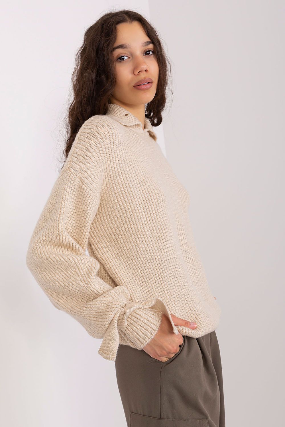 Badu Jumper in a stylish flat lay, featuring its chic design and high-quality materials for modern fashion lovers.