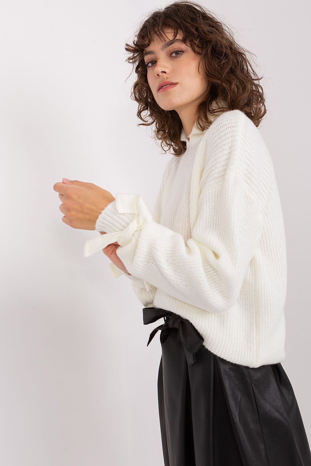 Fashionable Badu Jumper displayed on a model, showcasing its versatility for both casual and dressy occasions.