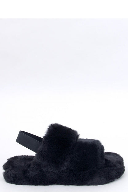 Luxurious women's fur slippers with elastic band from Inello, designed for ultimate comfort at home.