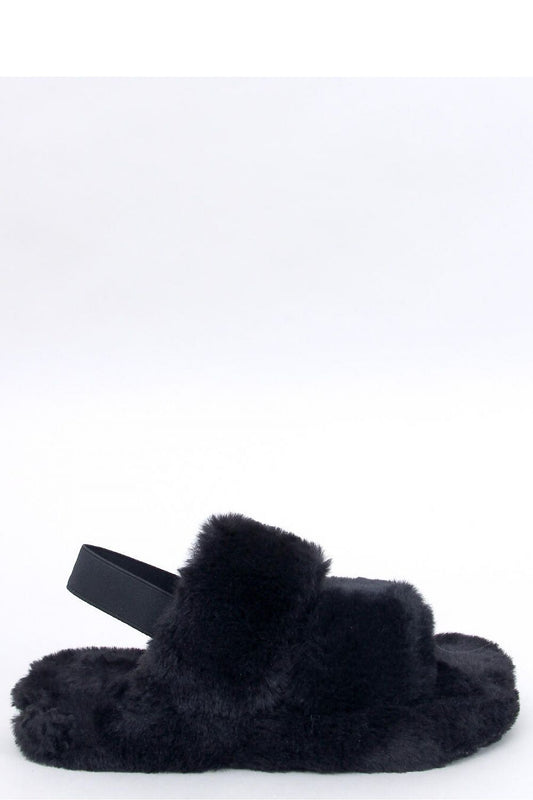 Luxurious women's fur slippers with elastic band from Inello, designed for ultimate comfort at home.