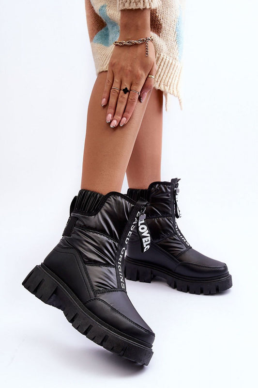 Luxury women's snow boots by Step in Style featuring thick fur insulation and front zipper closure, perfect for cold weather fashion.