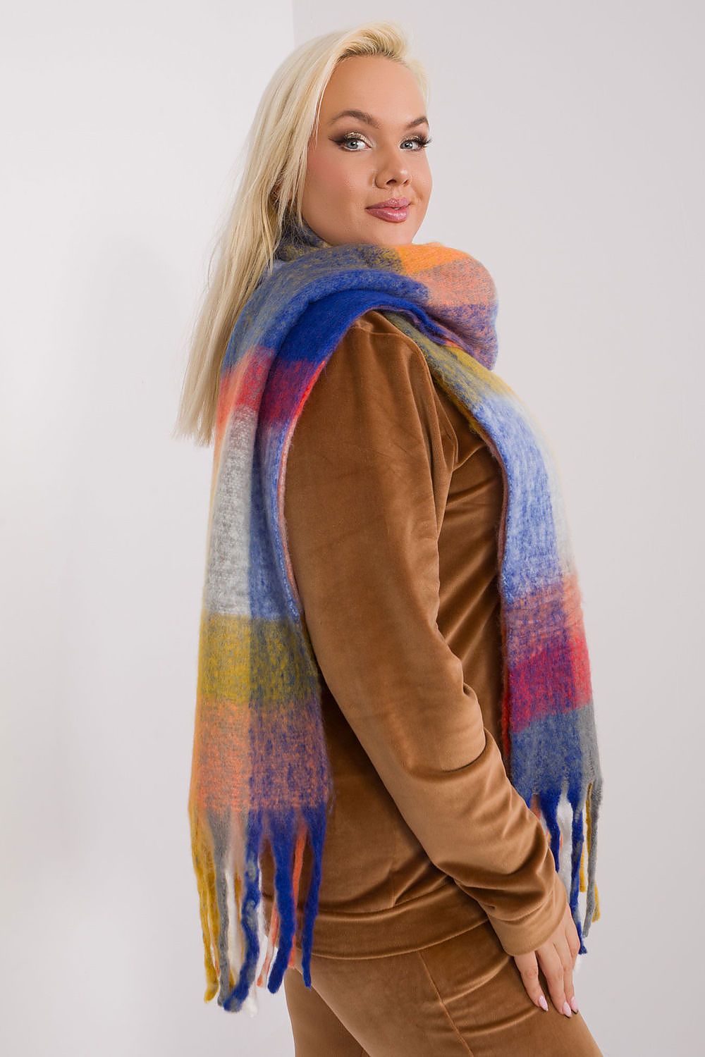 Stylishly draped polyester plaid scarf in vibrant colours by AT, ideal for adding warmth and sophistication to winter outfits.