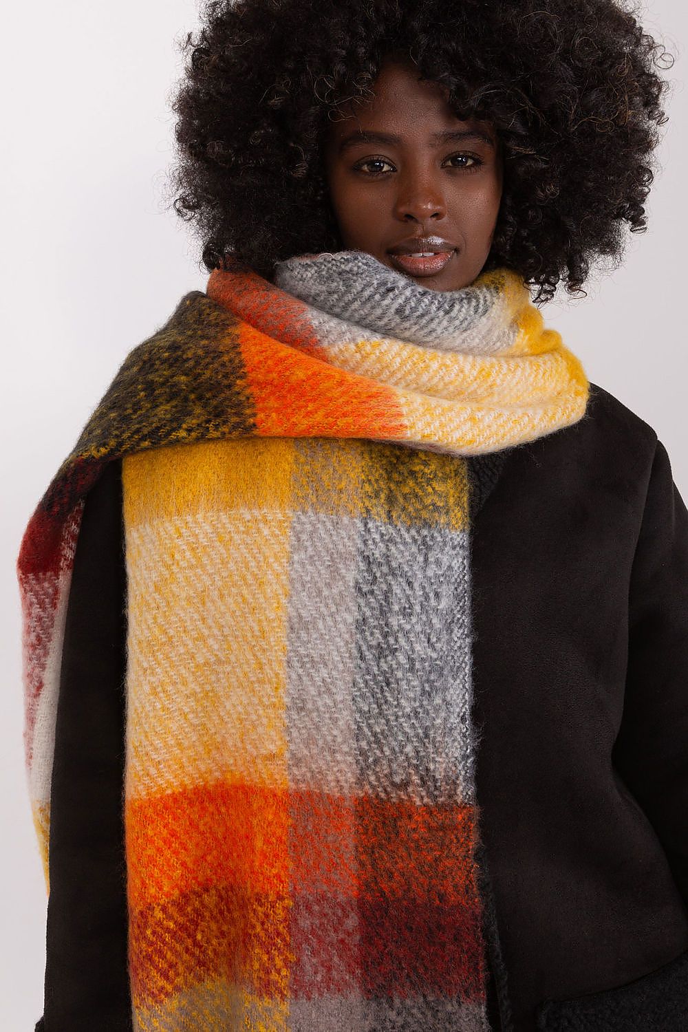 Luxurious long polyester plaid scarf by AT, featuring delicate tassels, ideal for stylish comfort in cold weather.