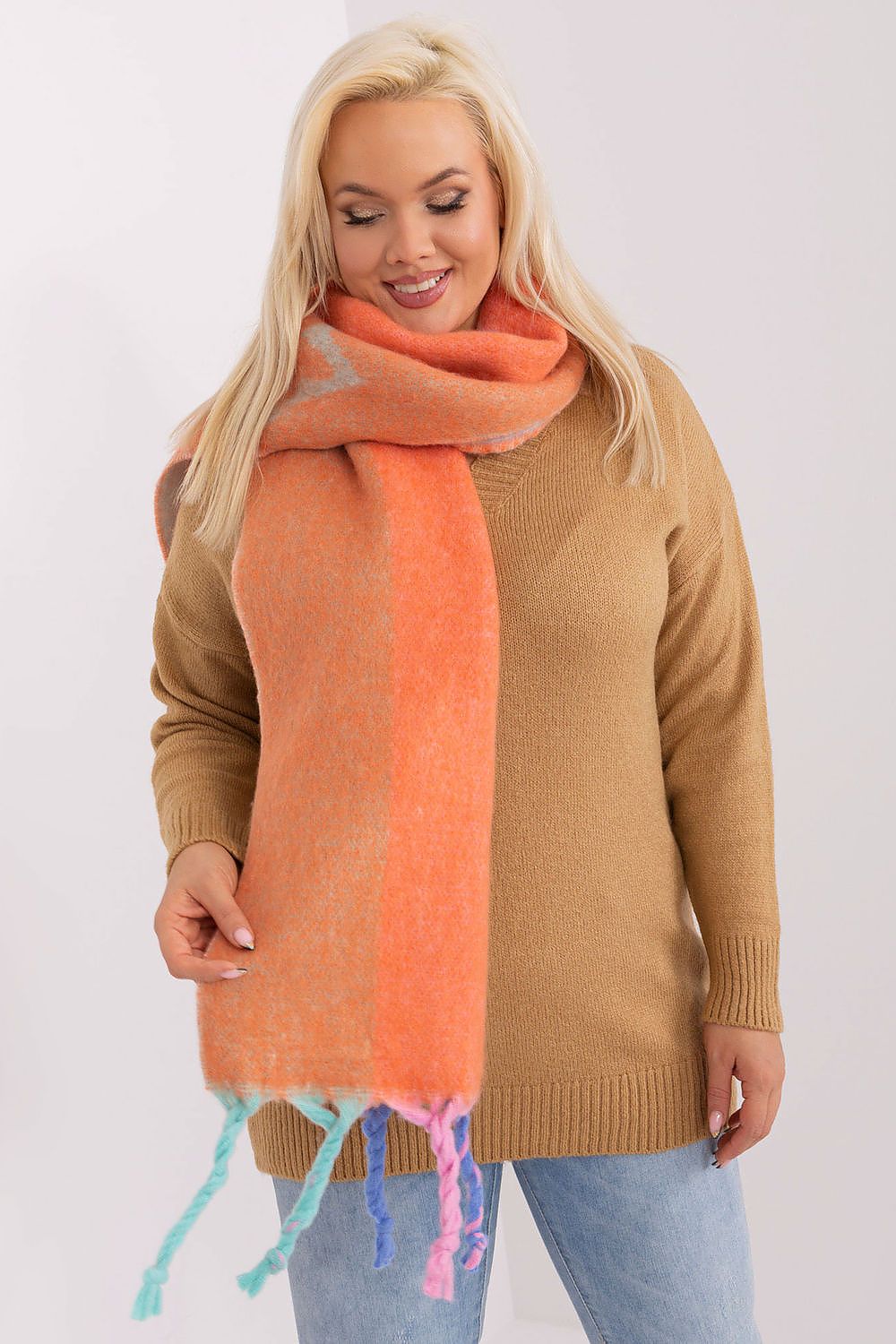 Stylish tasselled polyester shawl scarf with decorative stripes by AT, ideal for layering in cooler seasons.