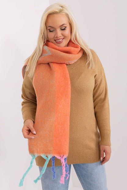 Stylish tasselled polyester shawl scarf with decorative stripes by AT, ideal for layering in cooler seasons.
