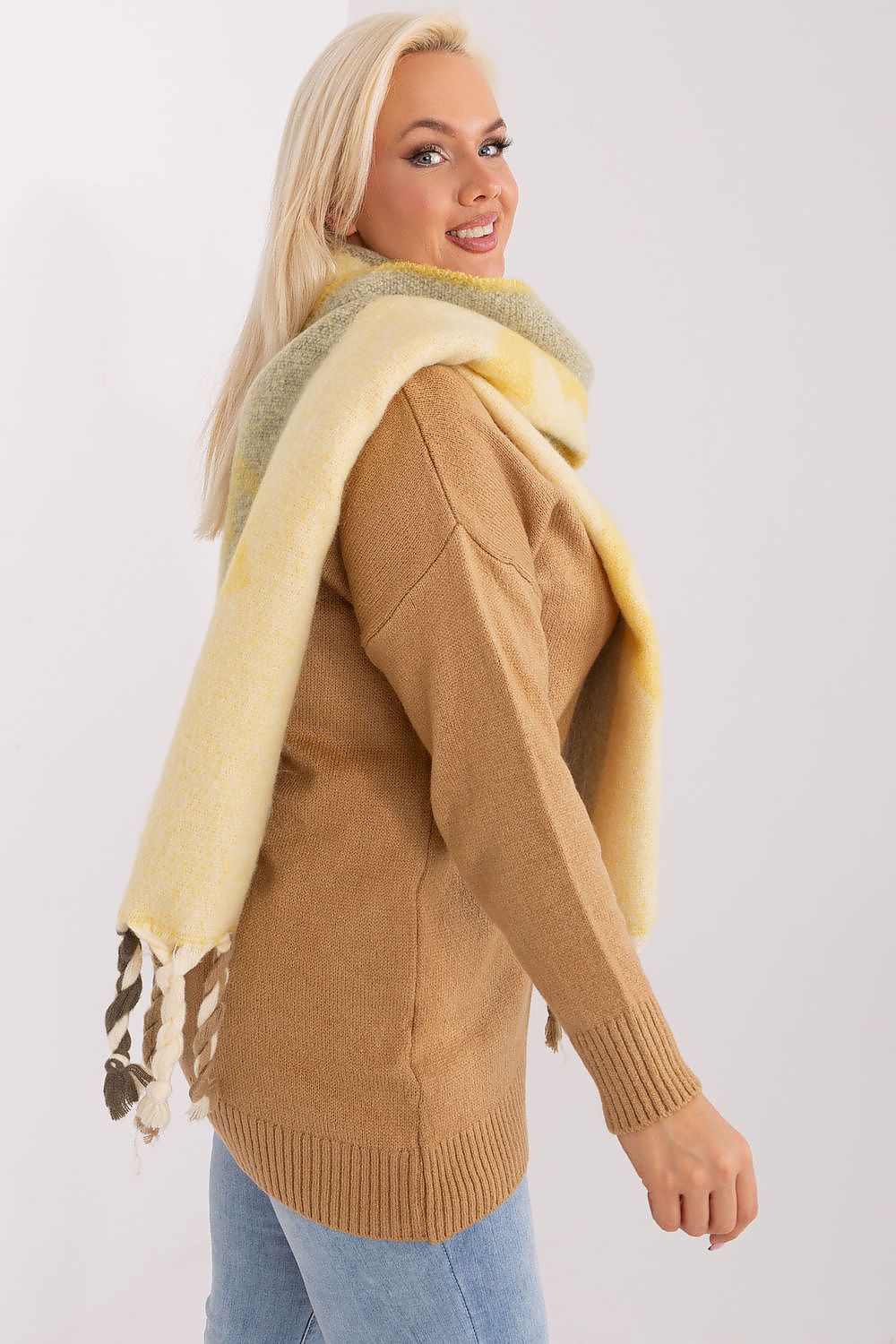 Elegant polyester shawl scarf with decorative stripes and tassels from AT, ideal for layering during colder seasons.
