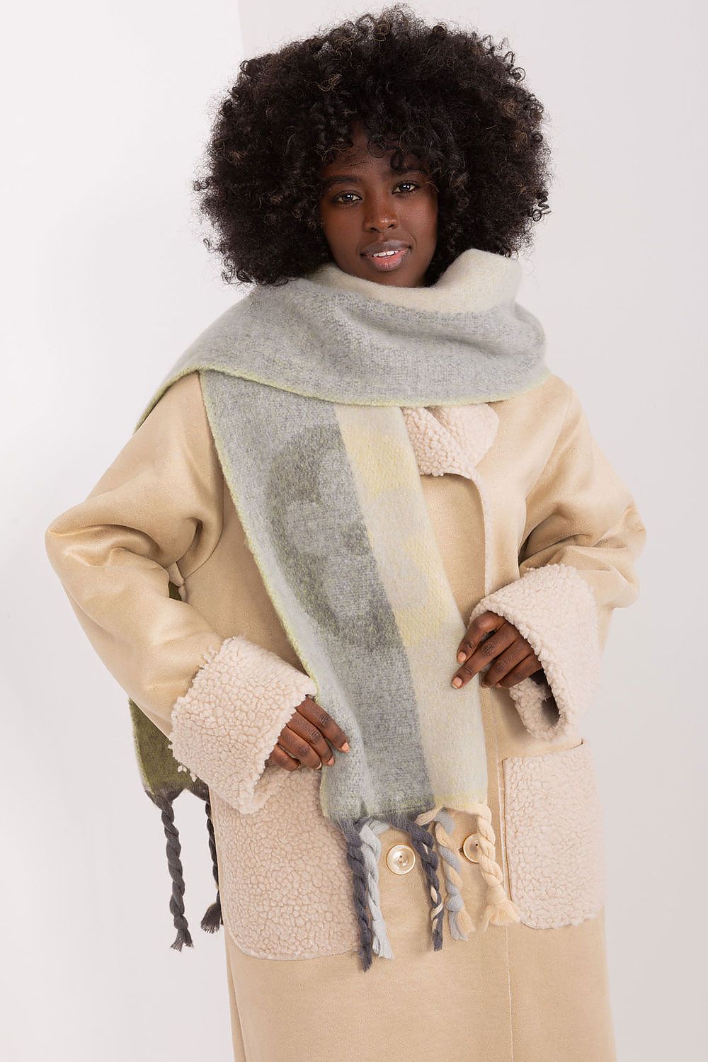 Luxurious tasselled polyester shawl scarf by AT, featuring decorative stripes, ideal for adding warmth and style during colder seasons.