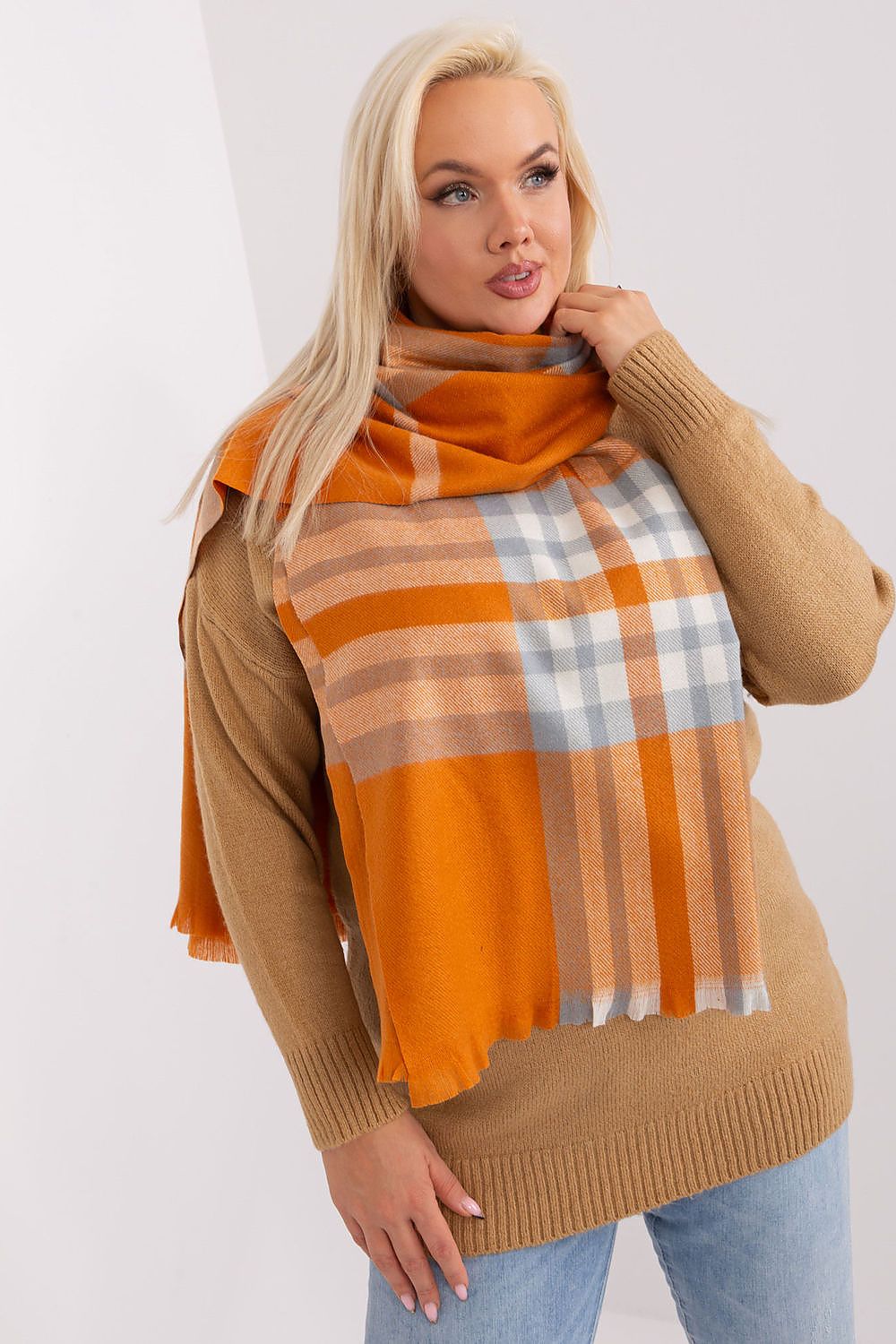 Glamorous plaid scarf by AT, featuring vibrant colours and a lengthy design, perfect for luxurious winter outfits.