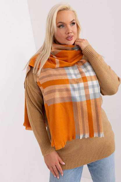 Glamorous plaid scarf by AT, featuring vibrant colours and a lengthy design, perfect for luxurious winter outfits.