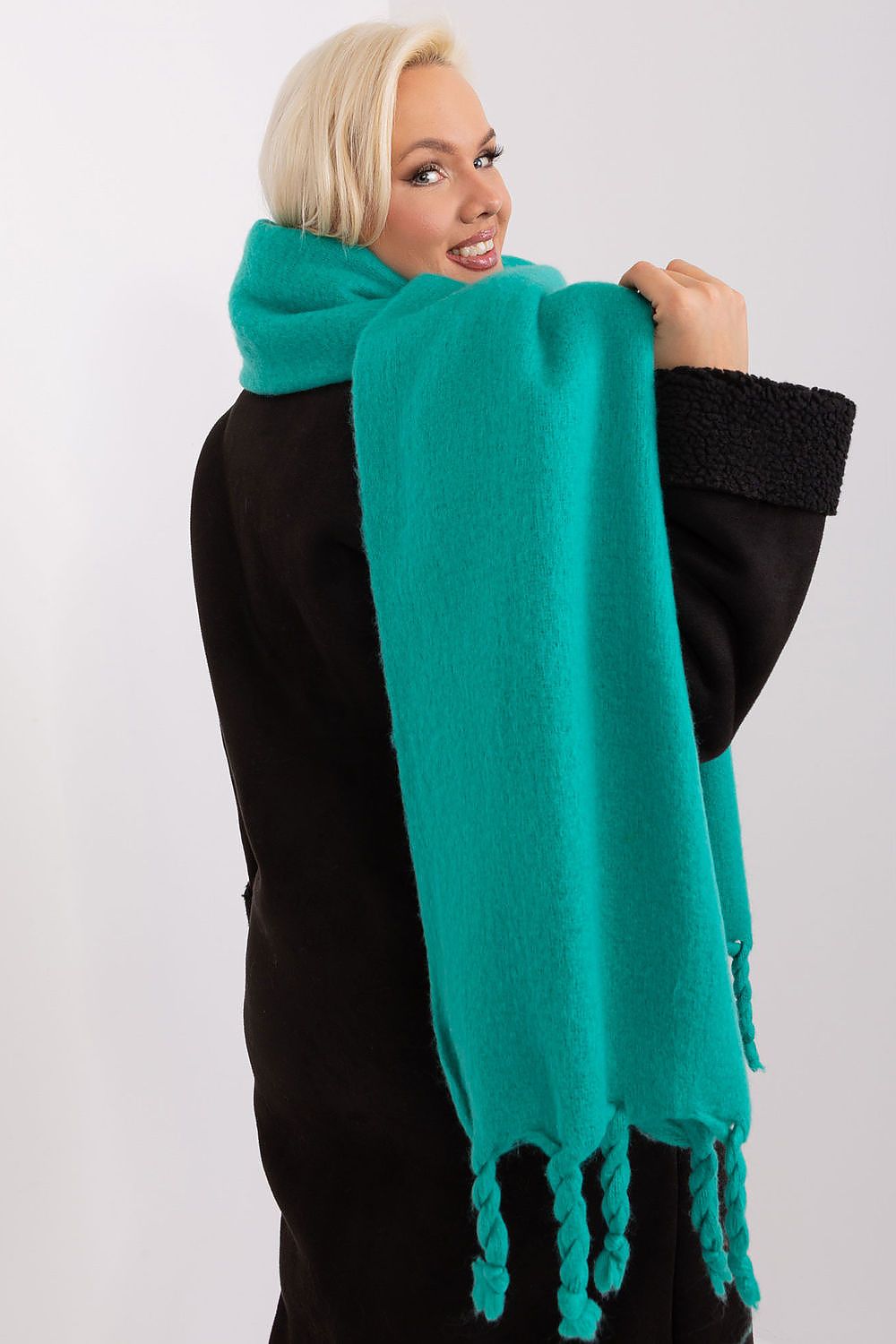 Versatile warm shawl by AT, showcasing a smooth texture and rich colour, perfect for layering during the colder months.