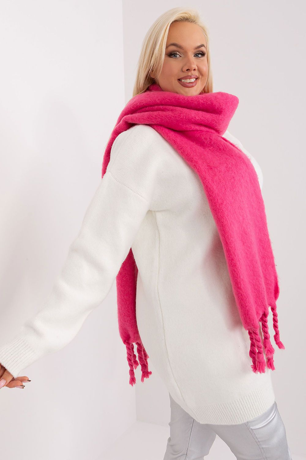 Elegant long scarf by AT with tassels, exemplifying luxury and style, essential for a fashionable winter wardrobe.