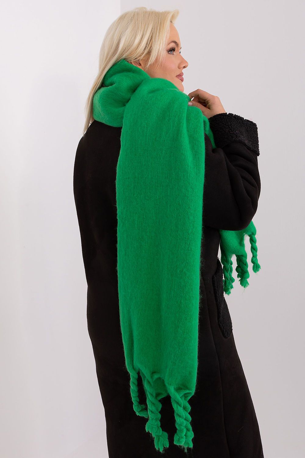 Sophisticated long polyester scarf by AT, showcasing a fashionable tassel detail, perfect for enhancing cold-weather attire.