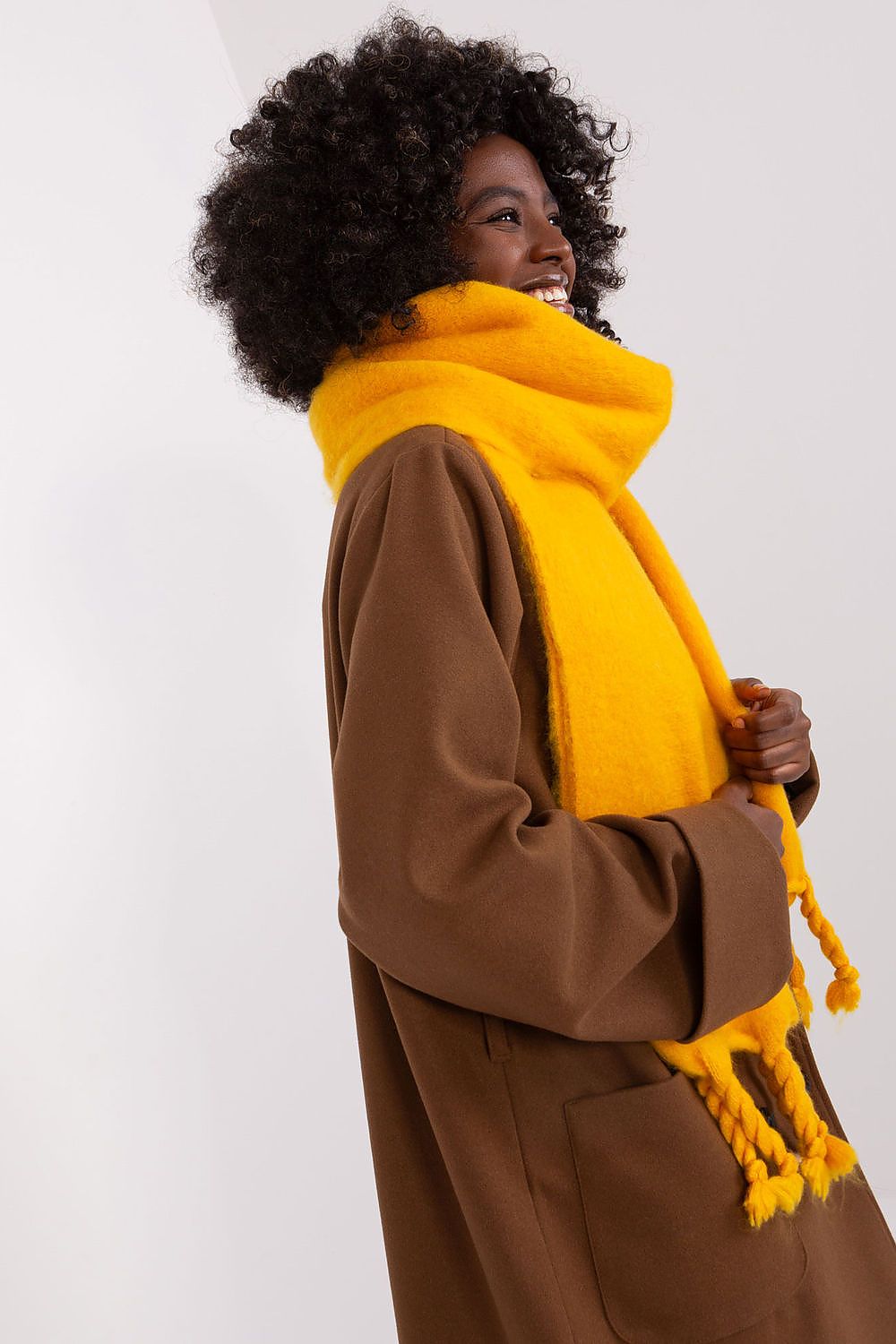 Elegant 100% polyester warm shawl with tassels for women by AT, ideal for layering in colder seasons.