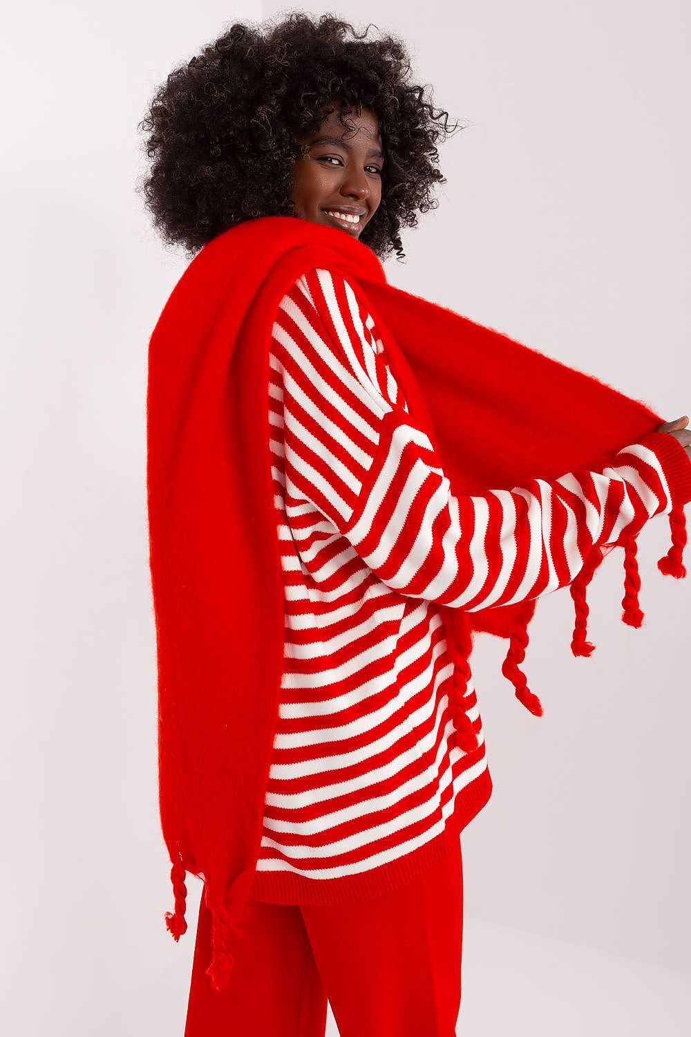 Stylish 100% polyester shawl with tassels, designed by AT, perfect for adding warmth and sophistication to any winter outfit.