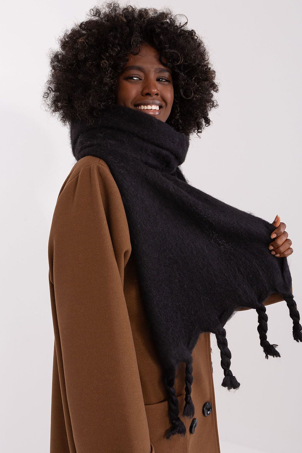 Cozy long scarf by AT in a rich colour, combining warmth and elegance for winter wear.
