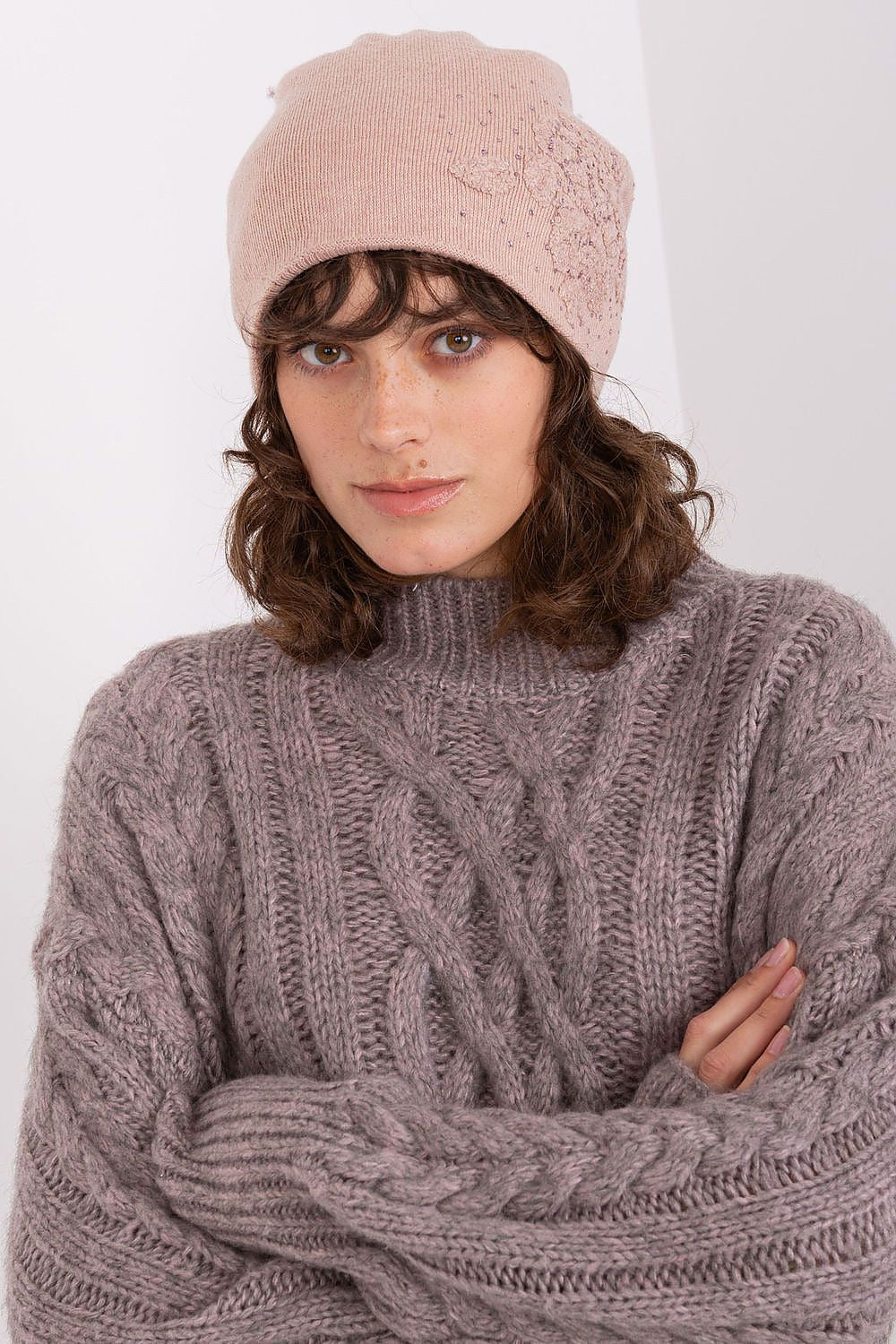 Luxury cashmere blend women's beanie hat by AT adorned with decorative rhinestones, perfect for winter elegance.