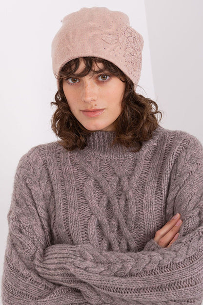 Luxury cashmere blend women's beanie hat by AT adorned with decorative rhinestones, perfect for winter elegance.