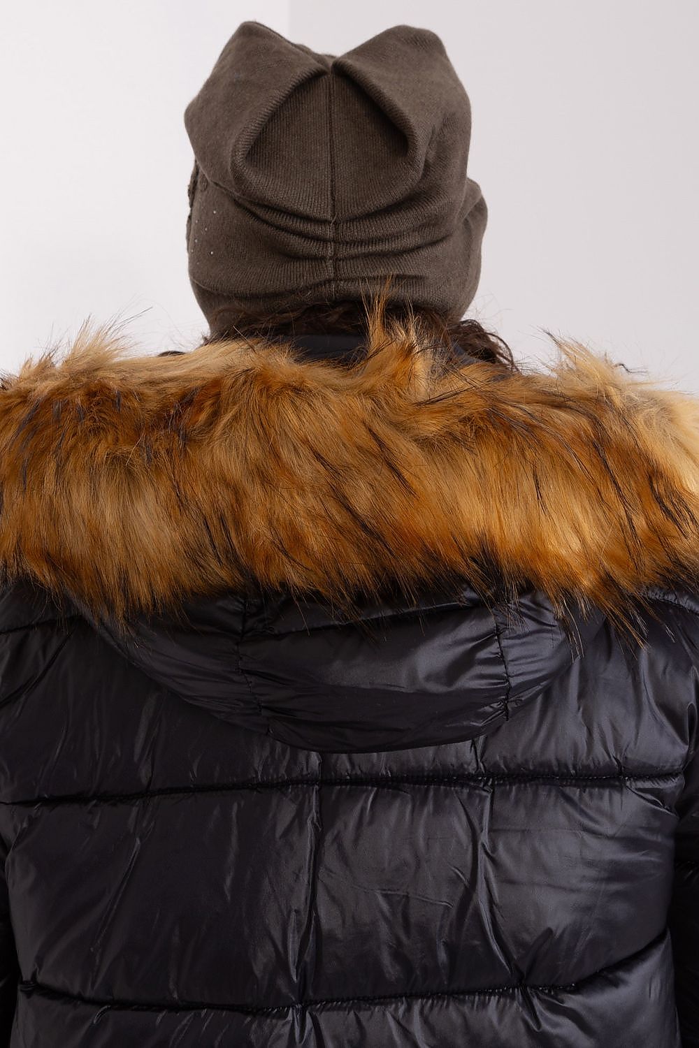 Elegant cashmere blend women's beanie hat by AT with decorative rhinestones, adding sophistication to winter outfits.