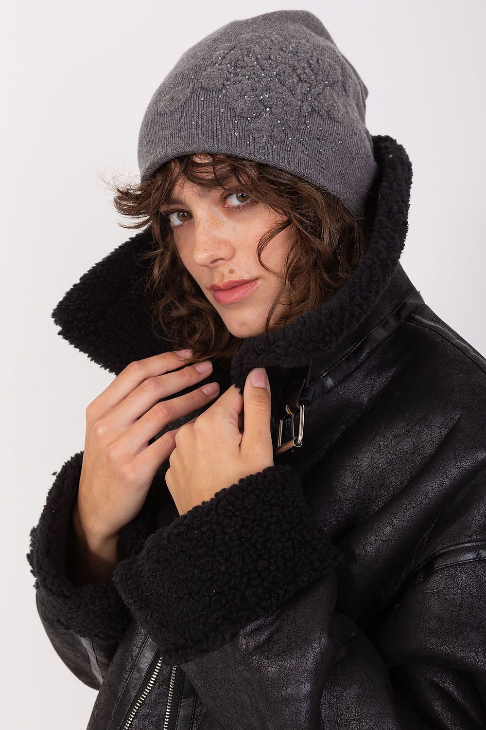 Elegant women's winter beanie hat by AT, made from cashmere blend with sparkling rhinestones for a chic look.