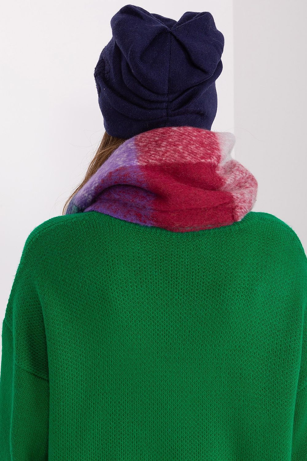 Elegant women's beanie hat in cashmere blend with sparkling rhinestone details, designed by AT for chic winter fashion.