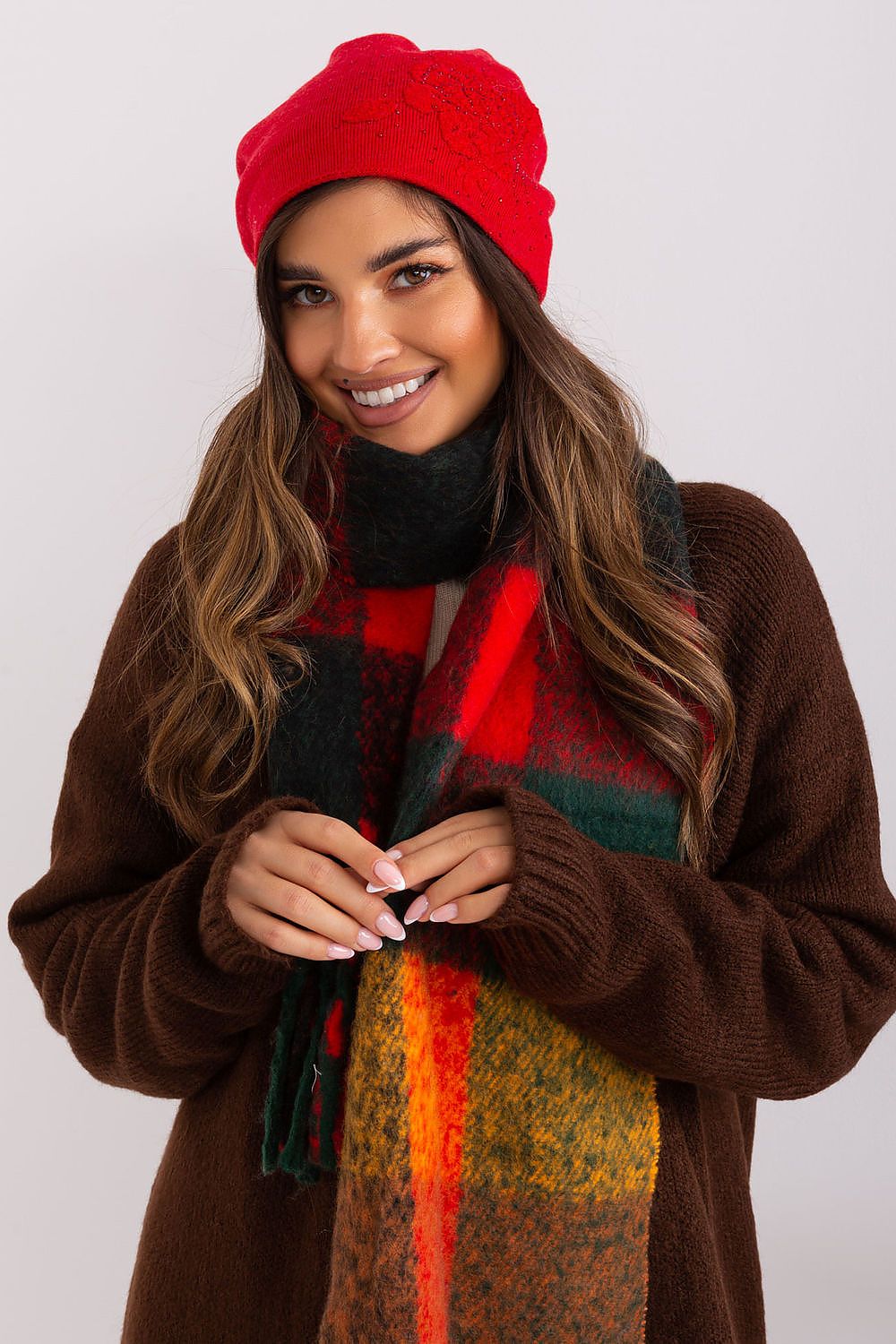 Elegant women's winter beanie hat featuring a soft cashmere blend and sparkling rhinestone details by AT.