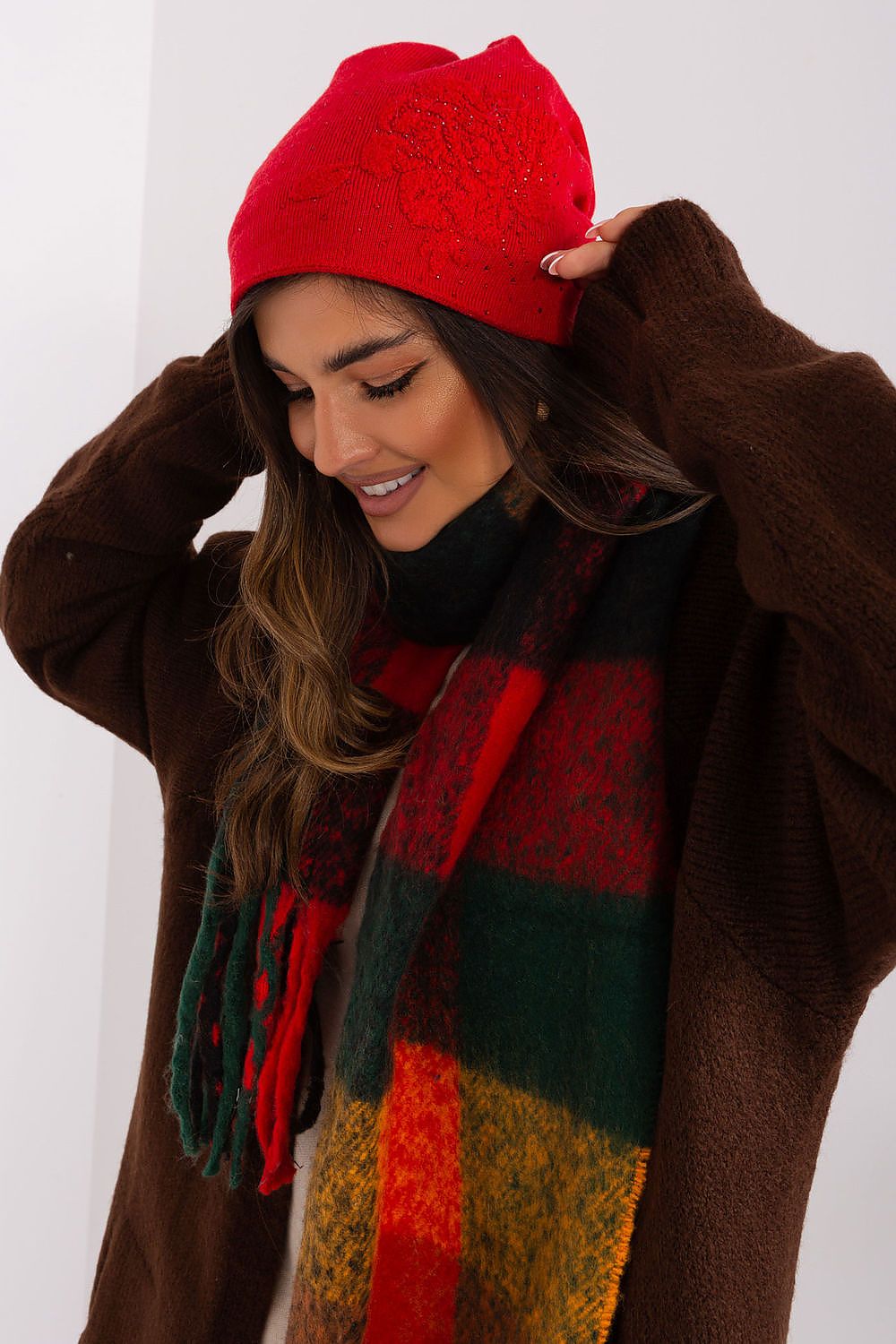 AT luxury winter beanie made from cashmere blend, showcasing stylish rhinestone embellishments.