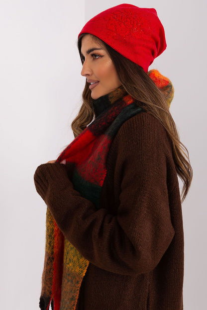 AT warm women's beanie hat in a luxurious cashmere blend with eye-catching rhinestones, ideal for winter elegance.
