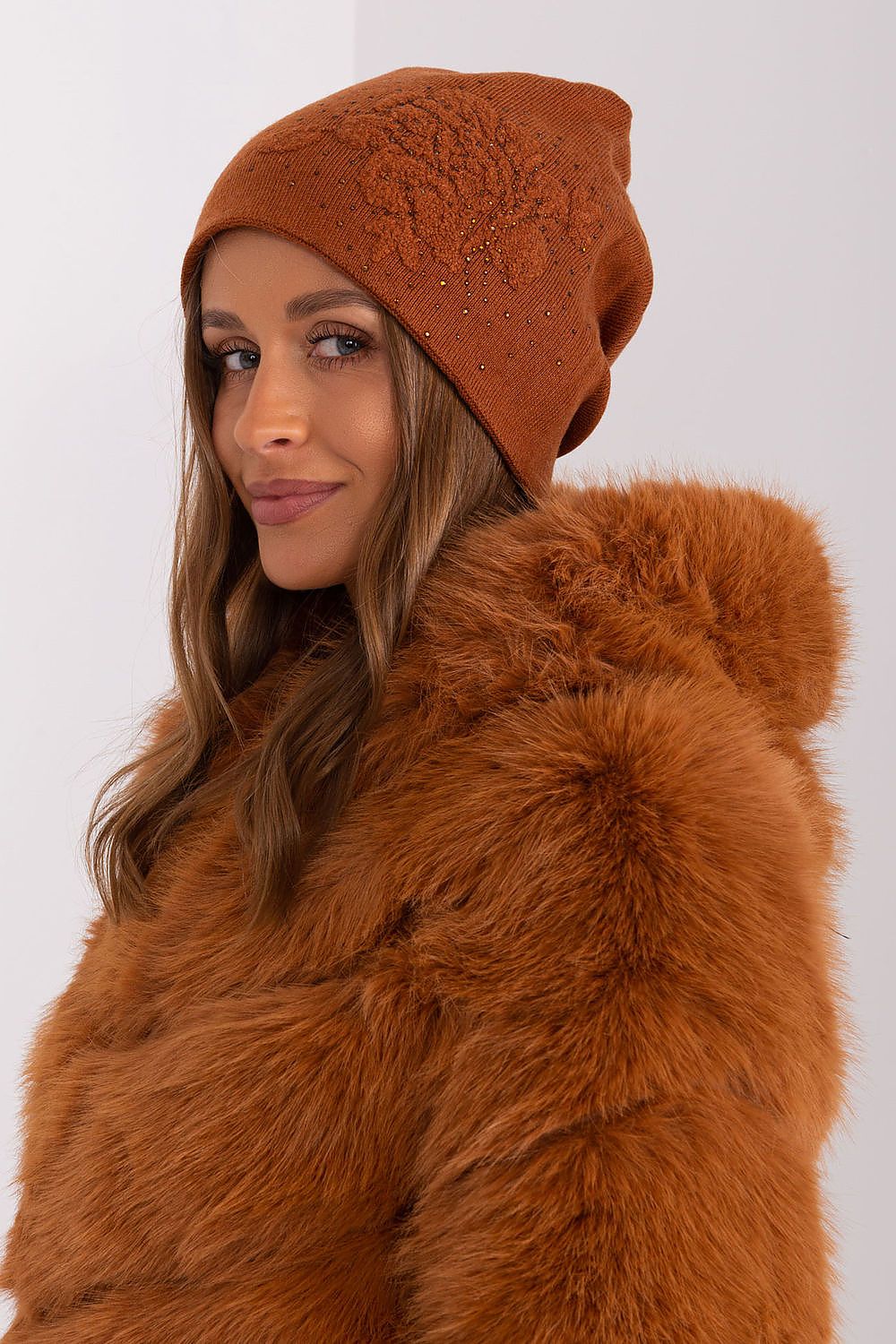Elegant women's beanie hat by AT in a fashionable cashmere blend with stunning rhinestone details for a chic winter look.