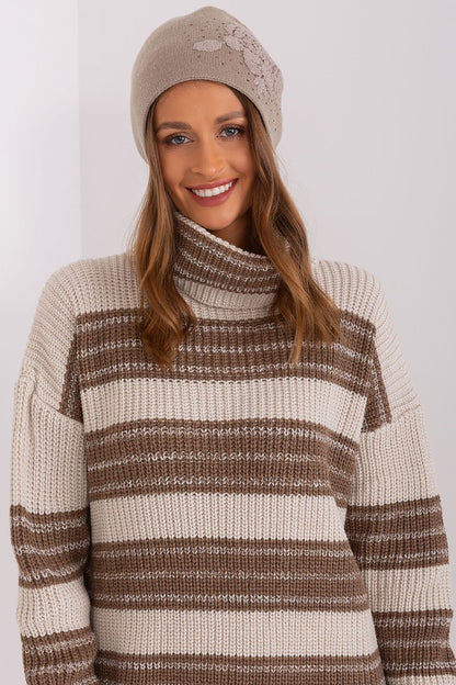 AT's high-quality women's cashmere blend beanie hat adorned with rhinestones, an essential accessory for stylish winter attire.