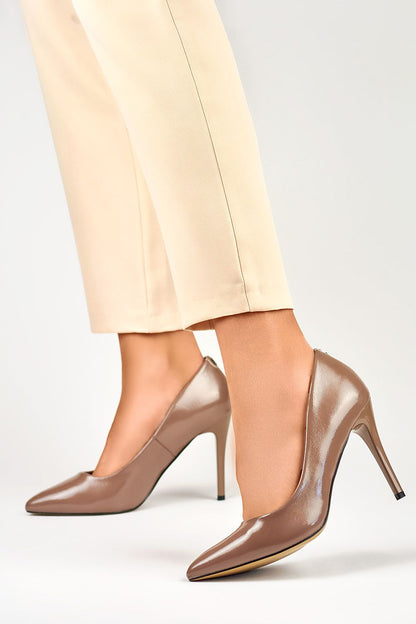 Elegant PRIMO classic patent leatherette stilettos showcasing a sleek pointed toe design, perfect for chic occasions.