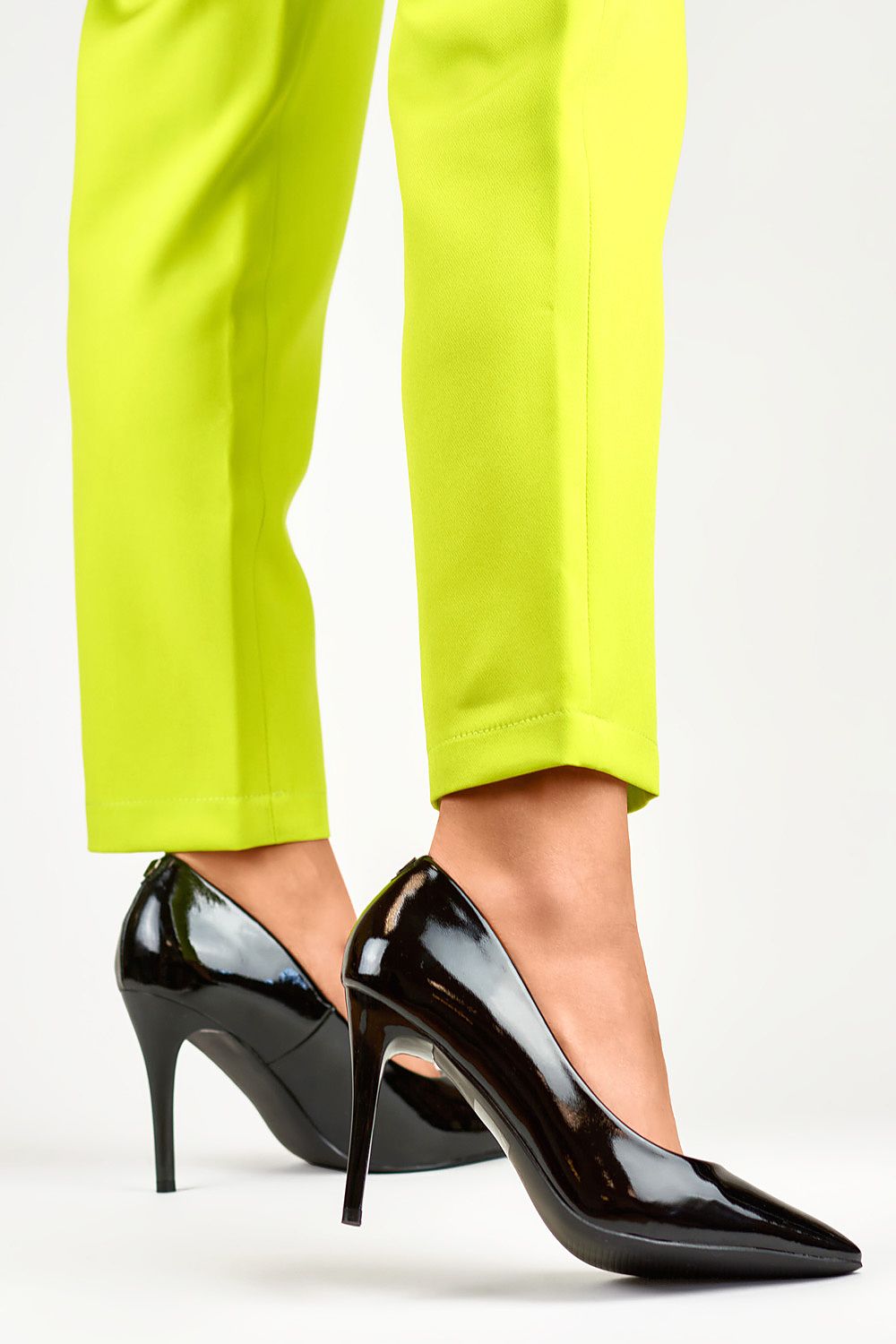 Elegant PRIMO classic patent leatherette stilettos with a pointed toe, showcasing a 9.5cm heel for a timeless chic look.