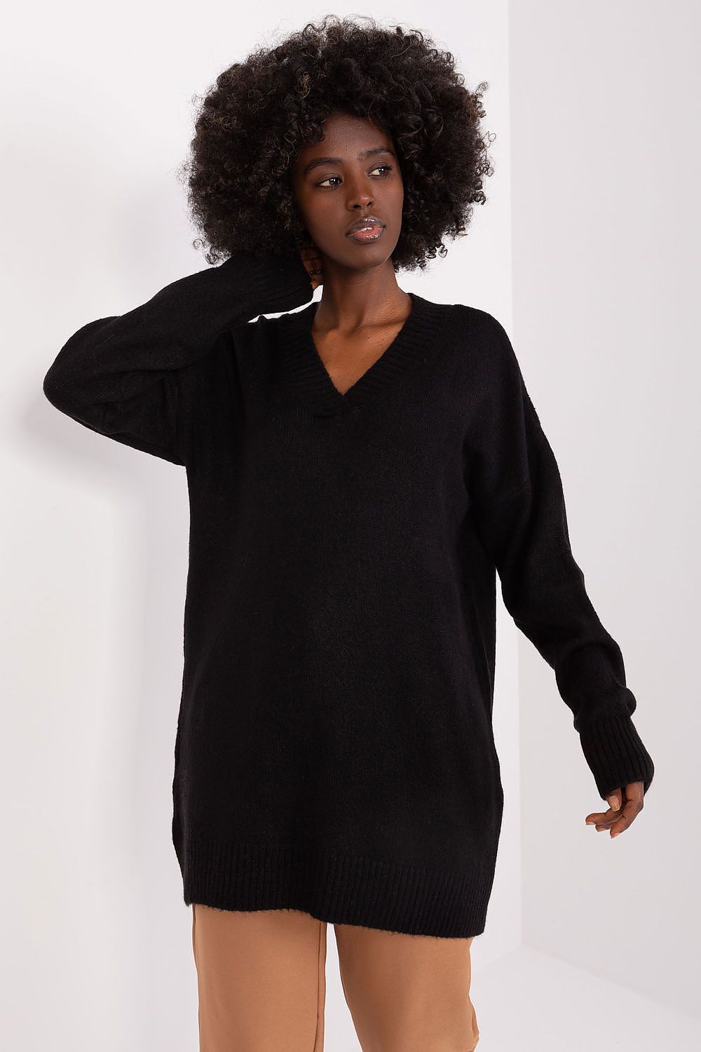 Close-up view of the luxurious texture of Badu's heart neckline sweater, emphasizing comfort and sophistication.
