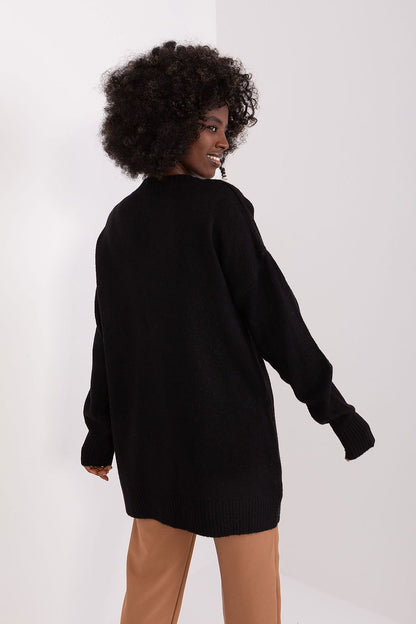 Badu acrylic blend sweater on a mannequin, highlighting its feminine heart neckline and timeless cut for a classy look.